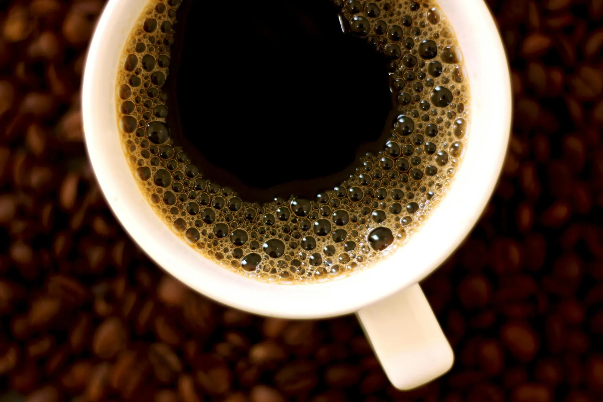 A coffee cup, drawn into the manifestation question
